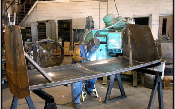 person custom welding in shop